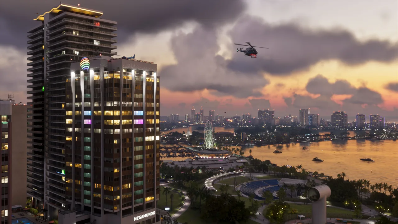 Vice City skyline at sunset, with a helicopter above the waterfront in an official GTA 6 screenshot.