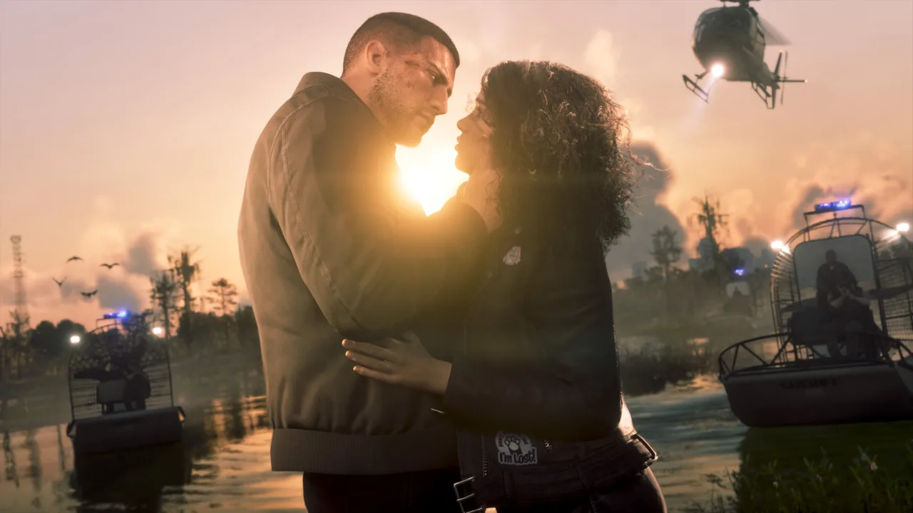 Jason and Lucia together at sunset, with police airboats and a helicopter behind them in an official GTA 6 screenshot.